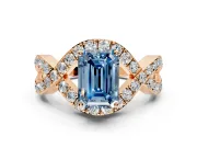 Halo Engagement Ring Setting for Fancy Blue Emerald Cut Center with Pave Infinity Twist Band and Prong Head in Rose Gold