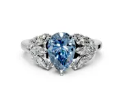 Leaf Cluster Engagement Ring Setting for Fancy Blue Pear-Shaped Center with Marquise Accents and Prong Head in Platinum
