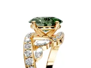 Solitaire Engagement Ring Setting for Fancy Green Oval Center with Pave Bypass Twist Band and Prong Head in Yellow Gold