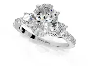 3 Stone Engagement Ring Setting for Oval Center with Round Cut Side Accents and Prong Head in White Gold