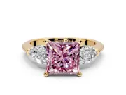 3 Stone Engagement Ring Setting for Fancy Pink Princess Cut Center with Large Pear-Shaped Accents and Prong Head in Yellow Gold