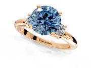 3 Stone Engagement Ring Setting for Fancy Blue Round Cut Center with Wide Plain Band and Prong Head in Rose Gold