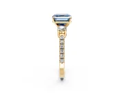 3 Stone Engagement Ring Setting for Fancy Blue Asscher Cut Center with Round Cut Side Accents and Prong Head in Yellow Gold