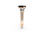 Channel-Set Engagement Ring Setting for Fancy Black Pear-Shaped Center with Baguette Band and Prong Head in Rose Gold
