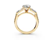 Channel-Set Engagement Ring Setting for Round Cut Center with Baguette Band and Prong Head in Yellow Gold