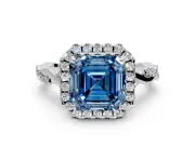 Halo Engagement Ring Setting for Fancy Blue Asscher Cut Center with Twist Band and Prong Head in White Gold