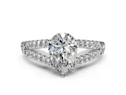 Solitaire Engagement Ring Setting for Pear-Shaped Center with Pave Split Shank and Prong Head in Platinum