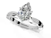 Solitaire Engagement Ring Setting for Pear-Shaped Center with Carved Leaf Shoulders and Prong Head in White Gold