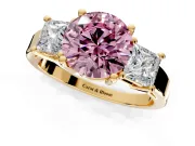 3 Stone Engagement Ring Setting for Fancy Pink Round Cut Center with Matching Side Accents and Prong Head in Yellow Gold