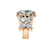 Floral Engagement Ring Setting for Oval Center with Marquise Cluster Shoulders and Prong Head in Rose Gold