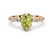 Cluster Engagement Ring Setting for Fancy Yellow Pear-Shaped Center with Round Cut Accent Band and Prong Head in Rose Gold
