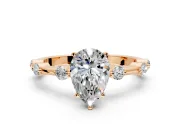 Solitaire Engagement Ring Setting for Pear-Shaped Center with Bezel Station Band and Prong Head in Rose Gold