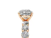 Shared-Prong Engagement Ring Setting for Cushion Cut Center with Graduated Accents and Prong Head in Rose Gold