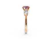 3 Stone Engagement Ring Setting for Fancy Pink Round Cut Center with Large Pear-Shaped Accents and Prong Head in Rose Gold
