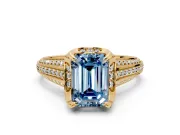 Solitaire Engagement Ring Setting for Fancy Blue Emerald Cut Center with Accented Split Shank and Prong Head in Yellow Gold