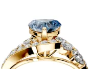 Halo Engagement Ring Setting for Fancy Blue Heart-Shaped Center with Marquise and Pave Bypass Band and Prong Head in Yellow Gold