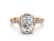 Halo Engagement Ring Setting for Radiant Cut Center with Openwork Halo, Pave Band and Prong Head in Rose Gold