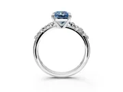 Solitaire Engagement Ring Setting for Fancy Blue Radiant Cut Center with Trailing Leaf Accent Band and Prong Head in Sterling Silver