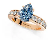 Solitaire Engagement Ring Setting for Fancy Blue Pear-Shaped Center with Channel-Set Accents and Prong Head in Rose Gold