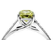 Solitaire Engagement Ring Setting for Fancy Yellow Emerald Cut Center with Round Cut Channel Band and Prong Head in Platinum