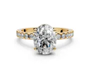 Solitaire Engagement Ring Setting for Oval Center with Band of Accents and Prong Head in Yellow Gold