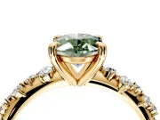 Solitaire Engagement Ring Setting for Fancy Green Oval Center with Trailing Leaf Accent Band and Prong Head in Yellow Gold