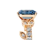 Leaf Motif Engagement Ring Setting for Fancy Blue Emerald Cut Center with Pave Band and Prong Head in Rose Gold