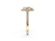 Halo Engagement Ring Setting for Pear-Shaped Center with Narrowing Pave Band and Prong Head in Yellow Gold