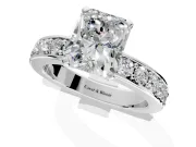 Solitaire Engagement Ring Setting for Radiant Cut Center with Channel-Set Accents and Prong Head in Platinum