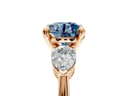 3 Stone Engagement Ring Setting for Fancy Blue Round Cut Center with Large Pear-Shaped Accents and Prong Head in Rose Gold
