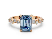 Solitaire Engagement Ring Setting for Fancy Blue Emerald Cut Center with Trailing Leaf Accent Band and Prong Head in Rose Gold
