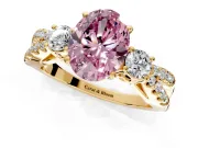 3 Stone Engagement Ring Setting for Fancy Pink Oval Center with Pave Split Shank and Prong Head in Yellow Gold