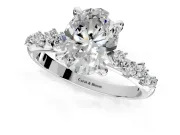 Solitaire Engagement Ring Setting for Oval Center with Trailing Leaf Accent Band and Prong Head in White Gold