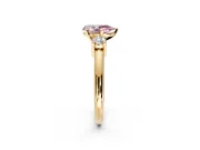 3 Stone Engagement Ring Setting for Fancy Pink Pear-Shaped Center with Wide Plain Band and Prong Head in Yellow Gold