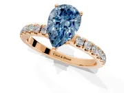 Open Basket Engagement Ring Setting for Fancy Blue Pear-Shaped Center with Pave Band and Prong Head in Rose Gold