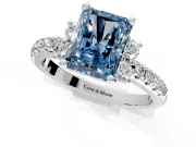 Paired Accent Engagement Ring Setting for Fancy Blue Radiant Cut Center with Pave Band and Prong Head in Platinum