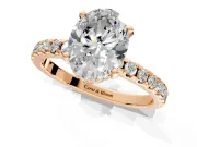 Solitaire Engagement Ring Setting for Oval Center with Band of Accents and Prong Head in Rose Gold