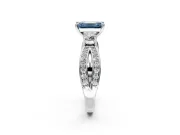 3 Stone Engagement Ring Setting for Fancy Blue Emerald Cut Center with Pave Twist Band and Prong Head in Platinum