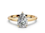 Solitaire Engagement Ring Setting for Pear-Shaped Center with Knife Ridge Band and Claw Prong Head in Yellow Gold