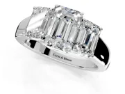 3 Stone Engagement Ring Setting for Emerald Cut Center with Raised Basket Heads and Prong Head in Platinum