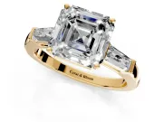 3 Stone Engagement Ring Setting for Asscher Cut Center with Tapered Baguettes, Plain Band and Prong Head in Yellow Gold