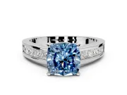 Solitaire Engagement Ring Setting for Fancy Blue Cushion Cut Center with Princess Cut Channel Band and Prong Head in White Gold