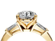 3 Stone Engagement Ring Setting for Round Cut Center with Channel Baguette Accents and Prong Head in Yellow Gold