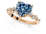 Solitaire Engagement Ring Setting for Fancy Blue Heart-Shaped Center with Trailing Leaf Accent Band and Prong Head in Rose Gold