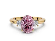 3 Stone Engagement Ring Setting for Fancy Pink Oval Center with Wide Plain Band and Prong Head in Yellow Gold
