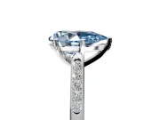 Solitaire Engagement Ring Setting for Fancy Blue Pear-Shaped Center with Channel Accents and Prong Head in Sterling Silver
