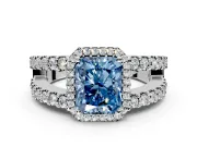 Halo Engagement Ring Setting for Fancy Blue Radiant Cut Center with Wide-Open Pave Split Shank and Prong Head in Platinum