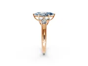 Cluster Engagement Ring Setting for Fancy Blue Marquise Center with Round Cut Accent Frame and Prong Head in Rose Gold