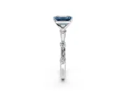 Solitaire Engagement Ring Setting for Fancy Blue Emerald Cut Center with Bezel Station Band and Prong Head in Sterling Silver
