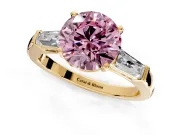 3 Stone Engagement Ring Setting for Fancy Pink Round Cut Center with Tapered Baguettes, Plain Band and Prong Head in Yellow Gold